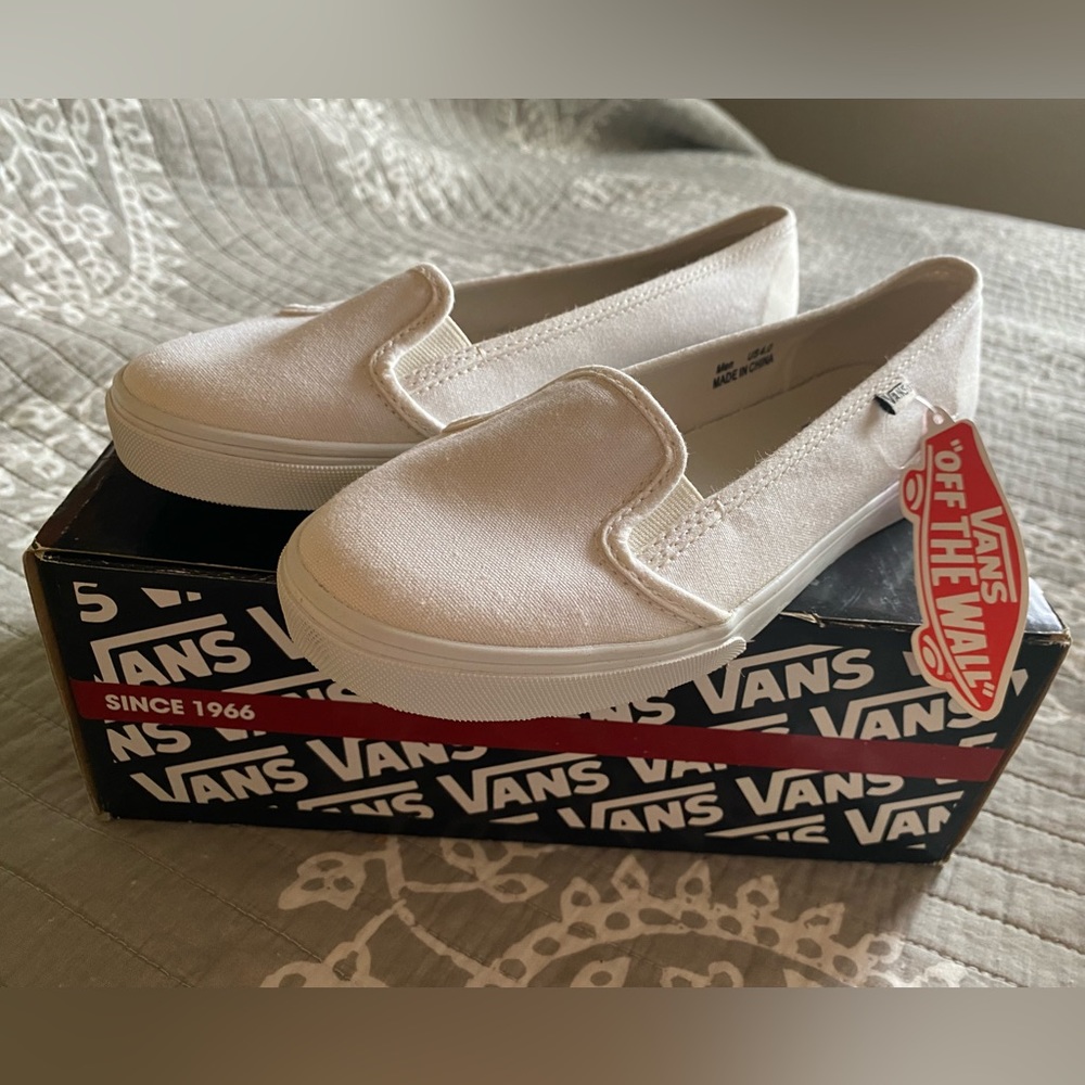 Womens Size 5.5 Brand new Vans slip ons in white.